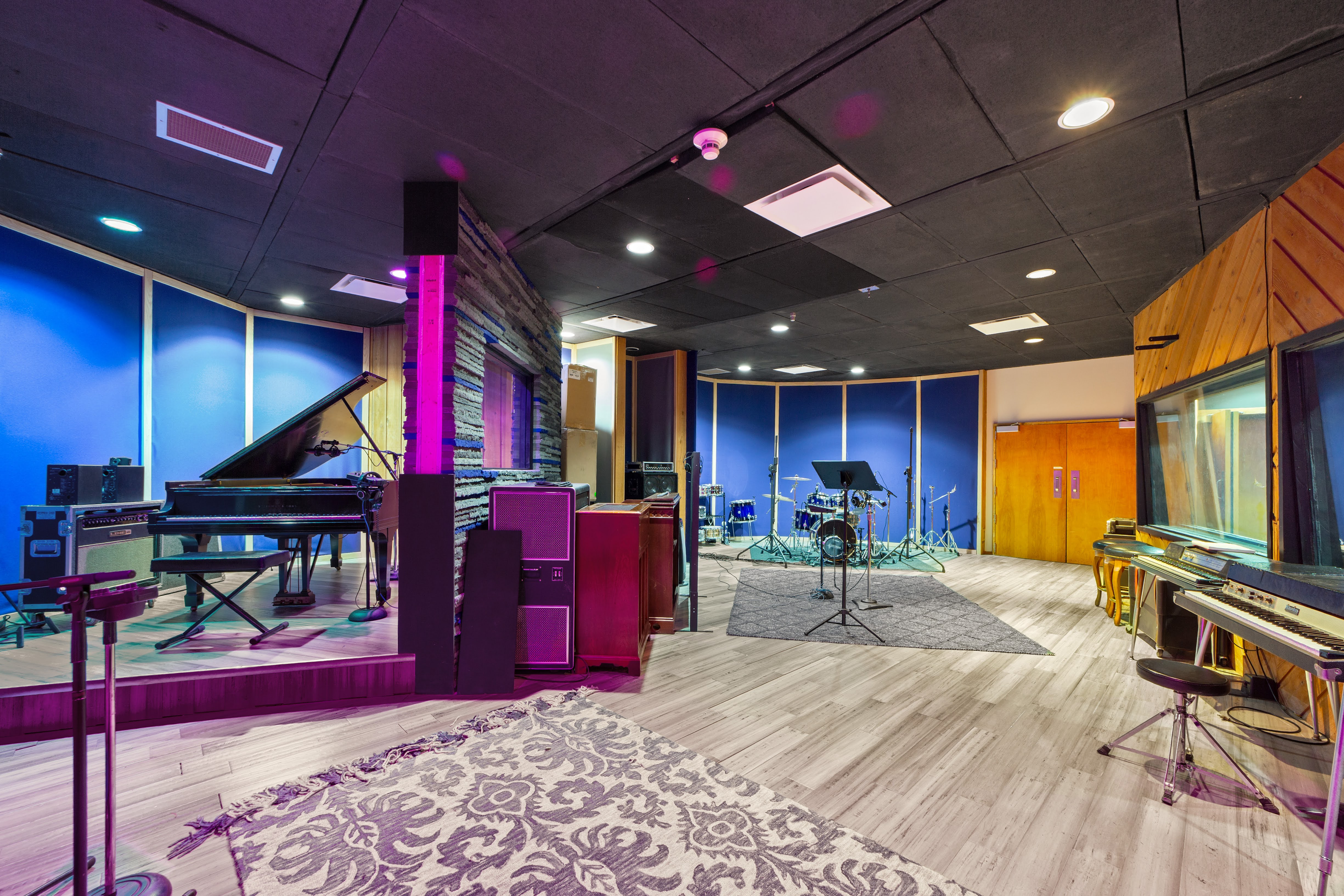 Professional music recording studio with grand piano