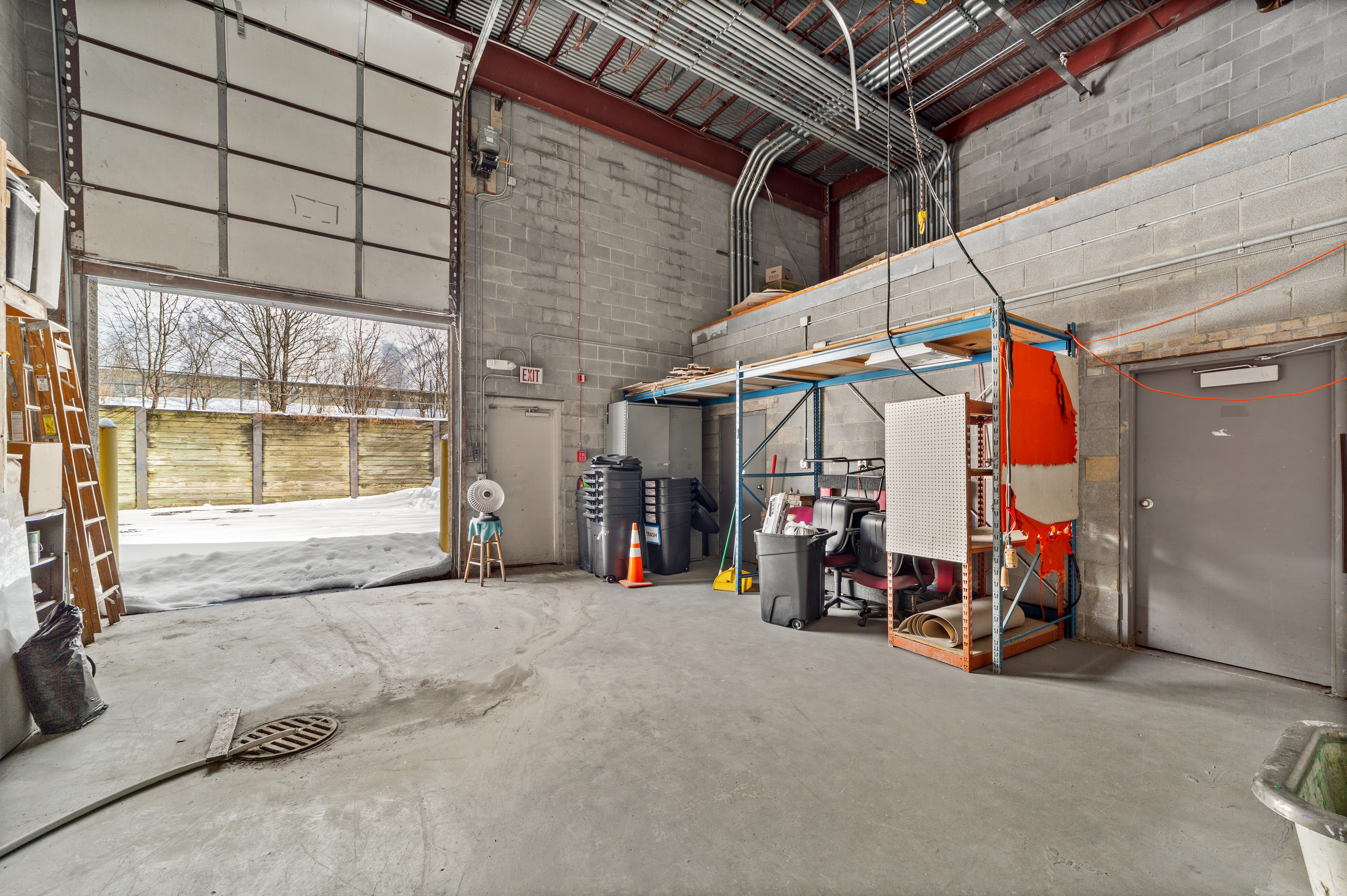 Industrial garage interior with bay door