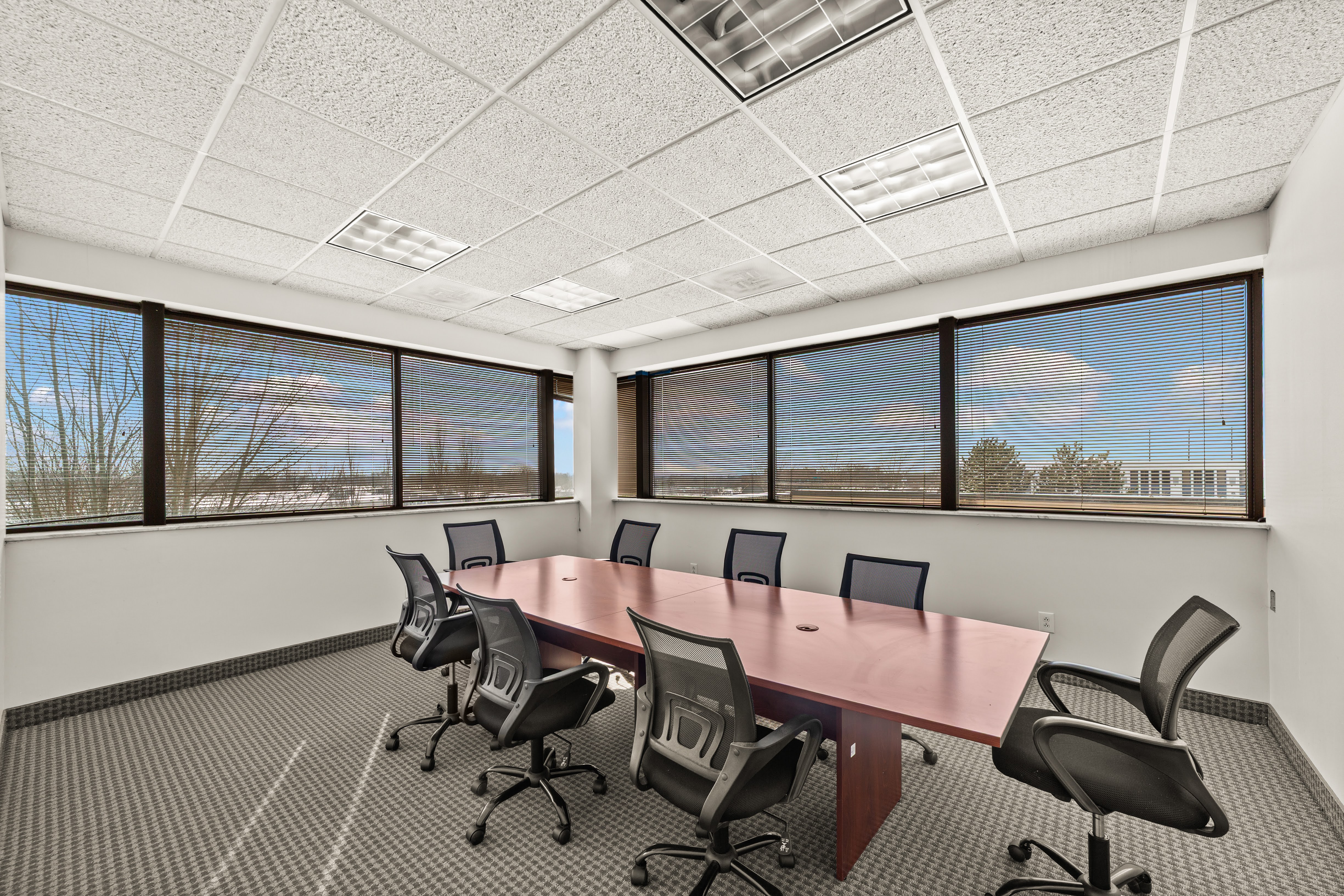 Empty conference room with wooden table
