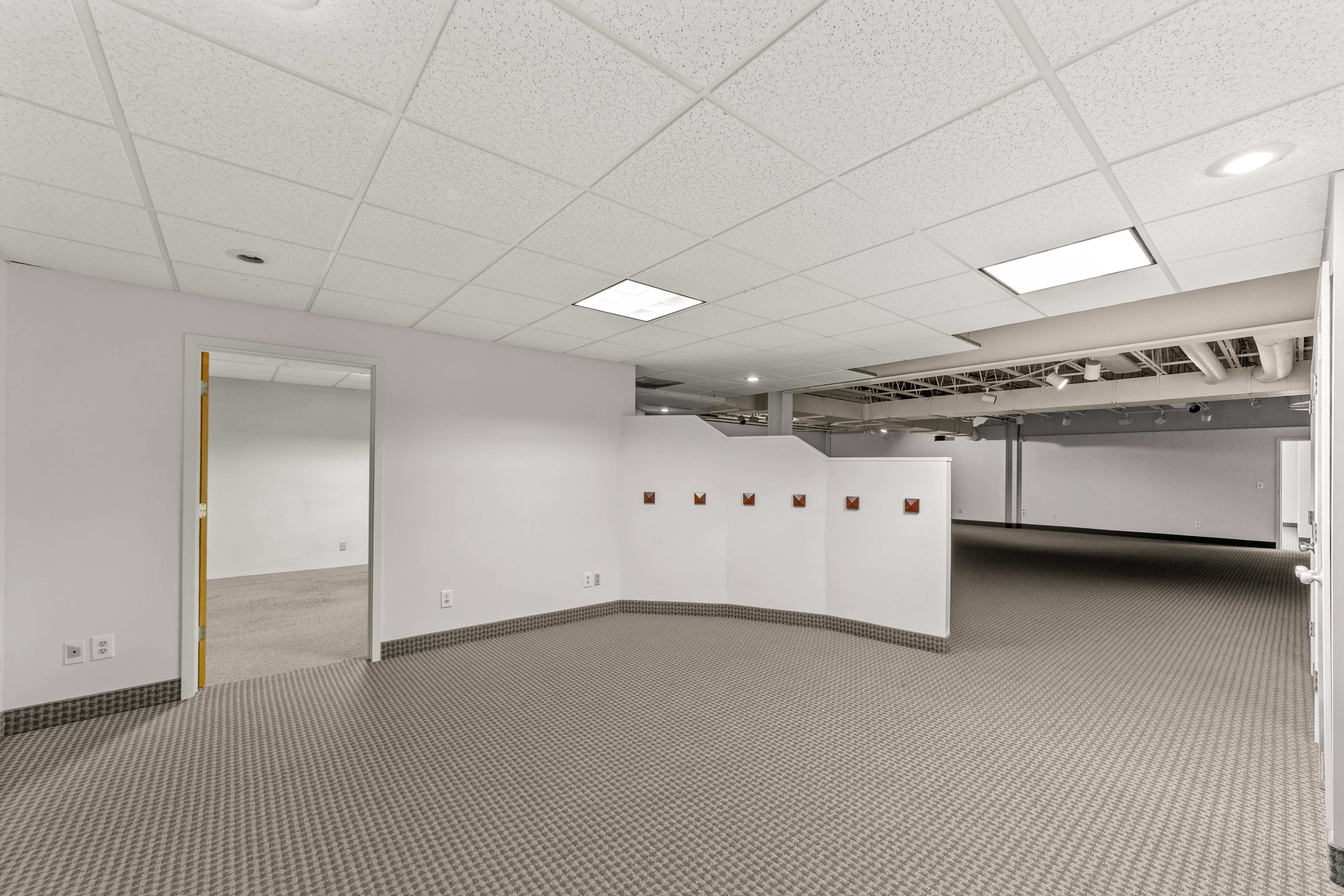 Modern commercial interior with curved partition