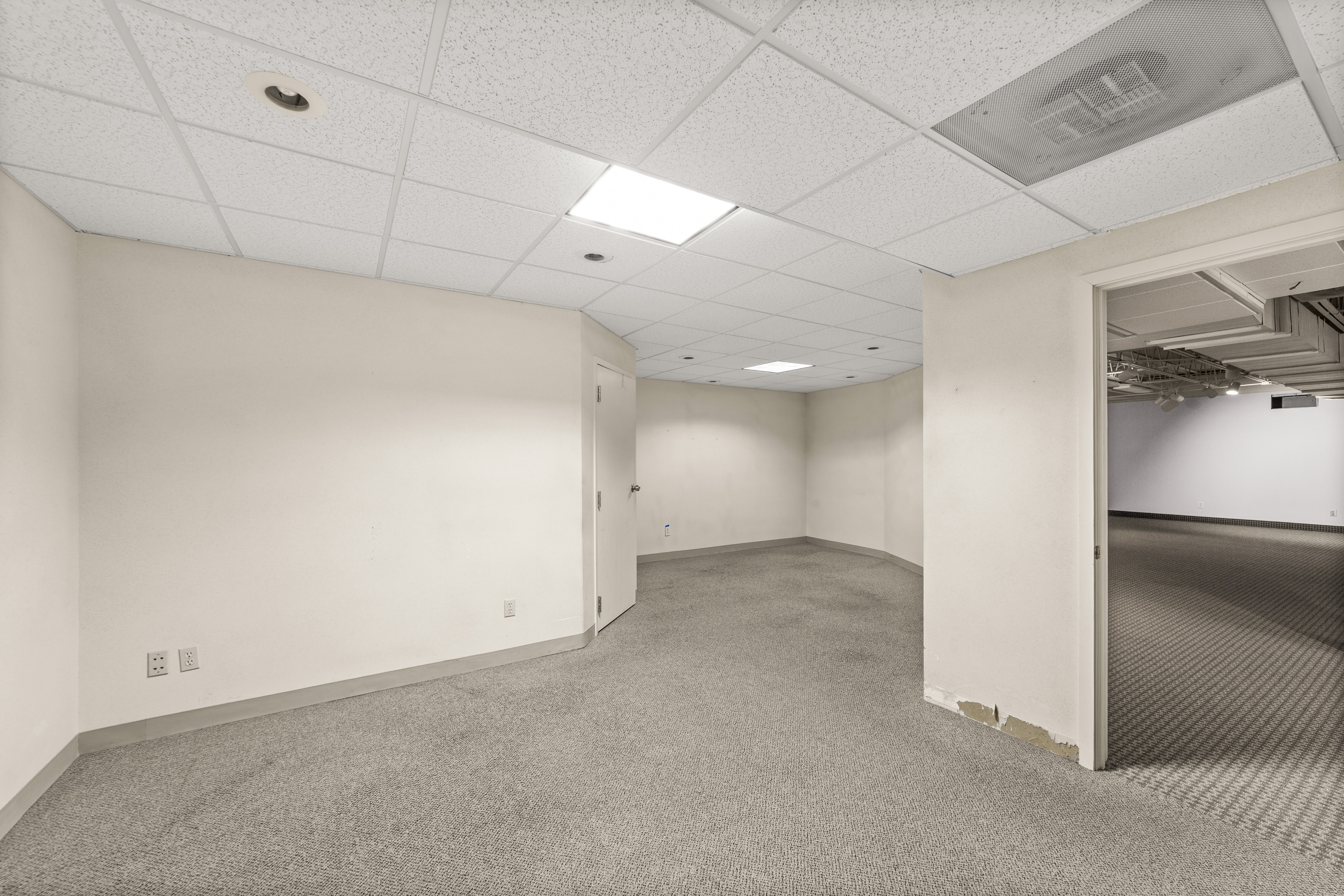Empty carpeted office or commercial space