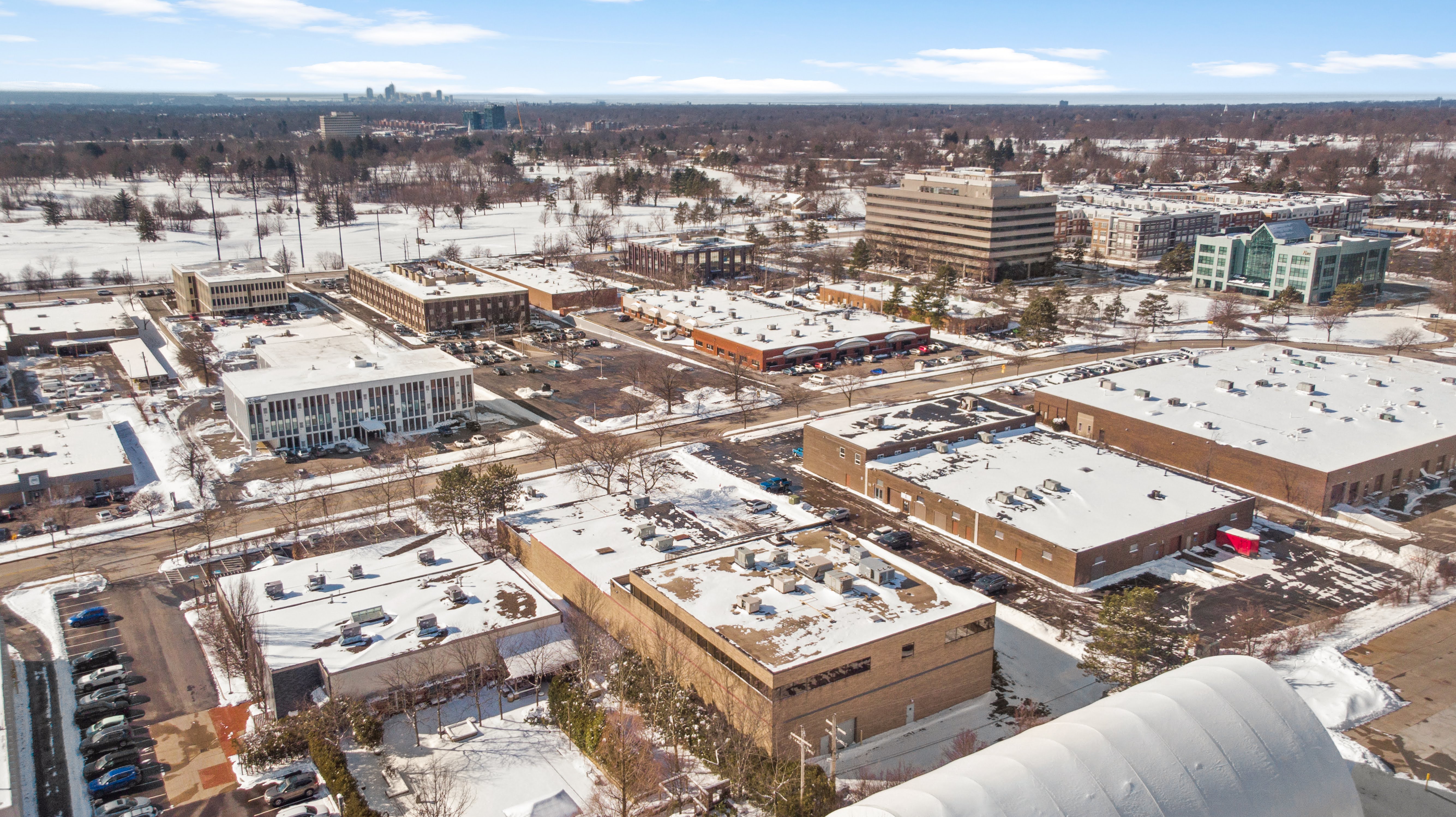 Aerial view of snow-covered business park